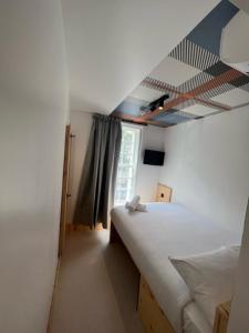 Postel nebo postele na pokoji v ubytování easyHotel Paddington