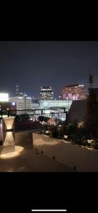 a view of a city skyline at night at Dawn House in Seoul