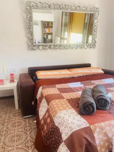 Łóżko lub łóżka w pokoju w obiekcie Appartamento luxury Belvedere