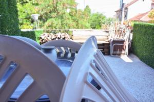 a group of chairs sitting on a patio at Vintage Blue in Kumanovo