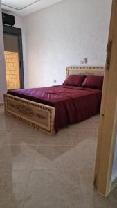 Ένα ή περισσότερα κρεβάτια σε δωμάτιο στο Apartamentos khalifa B1
