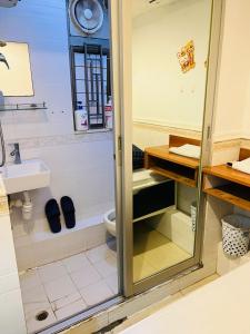 Koupelna v ubytování 嘉應賓館HAKKAS GUEST House