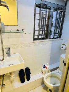 Koupelna v ubytování 嘉應賓館HAKKAS GUEST House