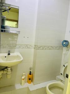 Koupelna v ubytování 嘉應賓館HAKKAS GUEST House