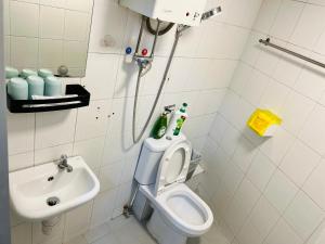 Koupelna v ubytování 嘉應賓館HAKKAS GUEST House