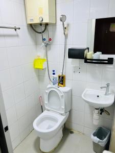 Koupelna v ubytování 嘉應賓館HAKKAS GUEST House