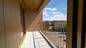 a balcony with a view of a street at Modern Apartments with Balcony in Merton near Wimbledon by Belvilla in Mitcham