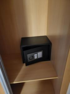 a safe in the corner of a closet at Hacienda de Alamo / Casa Veraneo in Fuente-Álamo de Murcia