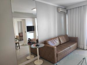 Кът за сядане в Flat 704 Triângulo Apart