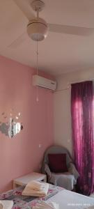 เตียงในห้องที่ Delphitea Philoxenia