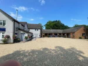 an empty driveway in front of a house at Village Limits Bed and Breakfast Rooms in Woodhall Spa