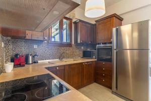 Kuchyň nebo kuchyňský kout v ubytování Sani Breeze by halu!