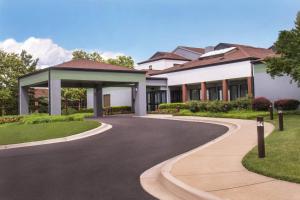 a house with a winding driveway at Courtyard By Marriott Baltimore BWI Airport in Linthicum Heights