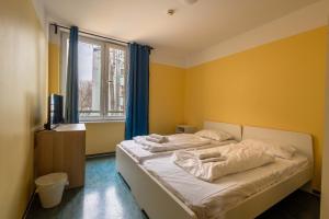 Postel nebo postele na pokoji v ubytování Pegasus Hostel Berlin