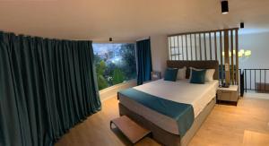 Postel nebo postele na pokoji v ubytování Illyrian Boutique Hotel