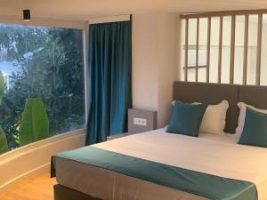 Postel nebo postele na pokoji v ubytování Illyrian Boutique Hotel