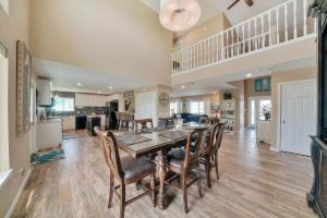 a kitchen and dining room with a table and chairs at Beach Dream in Navarre