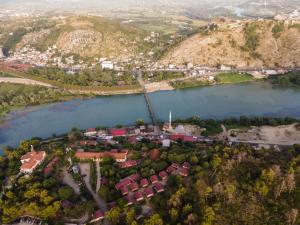 an aerial view of a town next to a lake at Village of Peace - House 26 in Shkodër