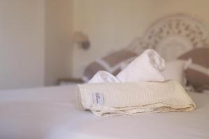 Postel nebo postele na pokoji v ubytování B&B Casa Madeo