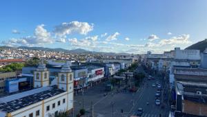 a view of a city with a street and buildings at Center Plaza Hotel in Caruaru