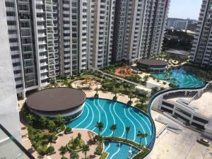 an aerial view of a large swimming pool in a city at Dwiputra Presint 15 at Putrajaya Blissful Suite in Putrajaya