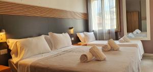 Postel nebo postele na pokoji v ubytování Bed & Bike Feltre