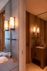a bathroom with a sink and a mirror at Luxury1BR at The Address Residences in JBR in Dubai