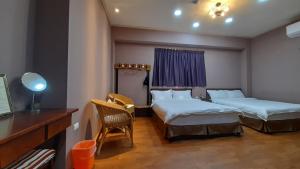 Vuode tai vuoteita majoituspaikassa Woolywo B&B 花蓮縣民宿第2451號