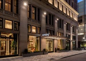 a facade of a building with a grocery store at Canopy By Hilton Philadelphia Center City in Philadelphia