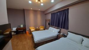 Vuode tai vuoteita majoituspaikassa Woolywo B&B 花蓮縣民宿第2451號