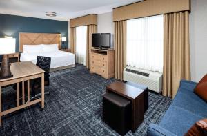 TV a/nebo společenská místnost v ubytování Homewood Suites by Hilton Austin/Round Rock
