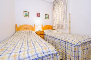 Posteľ alebo postele v izbe v ubytovaní Apartamento Alegria ID111