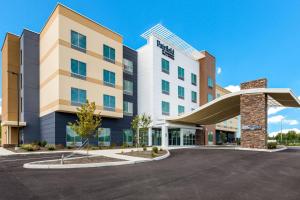 a rendering of the front of a hotel with a parking lot at Fairfield by Marriott Inn & Suites Knoxville Clinton in Clinton