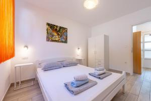 Posteľ alebo postele v izbe v ubytovaní Houses Trinetta