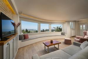 Et tv og/eller underholdning på Aeras Luxury Villa