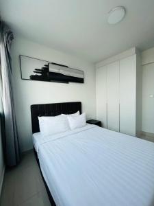Posteľ alebo postele v izbe v ubytovaní ImPian 2BR homestay