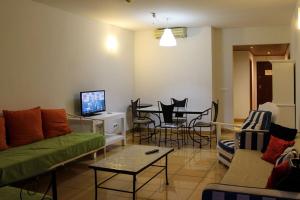 Televiisor ja/või meelelahutuskeskus majutusasutuses Apartamentos da Orada T1- D115 Marina de Albufeira