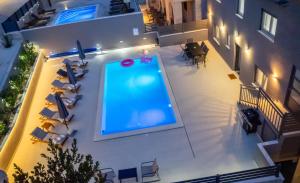 Bazén v ubytování Luxury Apartment Lorena - Private Heated Pool - nebo v jeho okolí