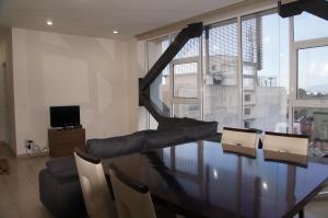 Posezení v ubytování Lujoso Penthouse en la Roma