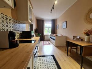 Kuchyňa alebo kuchynka v ubytovaní Perfect Stay - "Apartament Zamkowy" - parking place