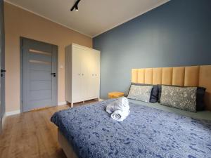Posteľ alebo postele v izbe v ubytovaní Perfect Stay - "Apartament Zamkowy" - parking place