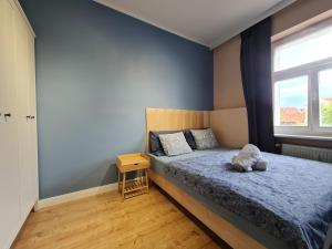 Posteľ alebo postele v izbe v ubytovaní Perfect Stay - "Apartament Zamkowy" - parking place