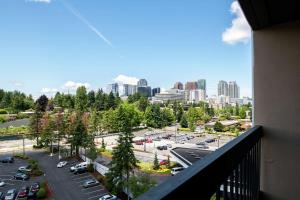 a view of a parking lot from a balcony at Hilton Bellevue in Bellevue