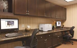 a office with a desk with a computer and chairs at Homewood Suites by Hilton Houston - Northwest/CY-FAIR in Houston