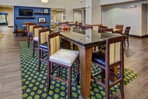 a conference room with a table and chairs at Hampton Inn & Suites Clermont in Clermont