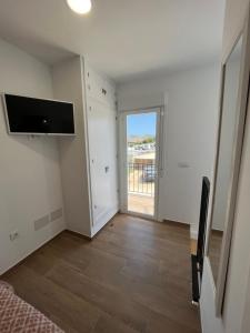 Μια τηλεόραση ή/και κέντρο ψυχαγωγίας στο Duplex Triana III