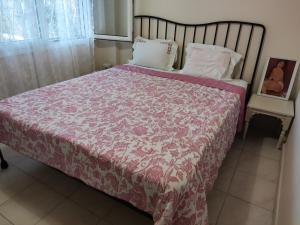 Un pat sau paturi într-o cameră la Villa Aeolus