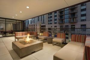 a balcony with a fire pit on a building at Home2 Suites By Hilton Chicago River North in Chicago