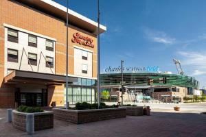 a building with a sign on the side of it at Hilton Garden Inn Omaha Downtown-Old Market Area in Omaha