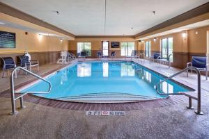 a large swimming pool in a hotel room at Hampton Inn & Suites Austin South Buda in Buda